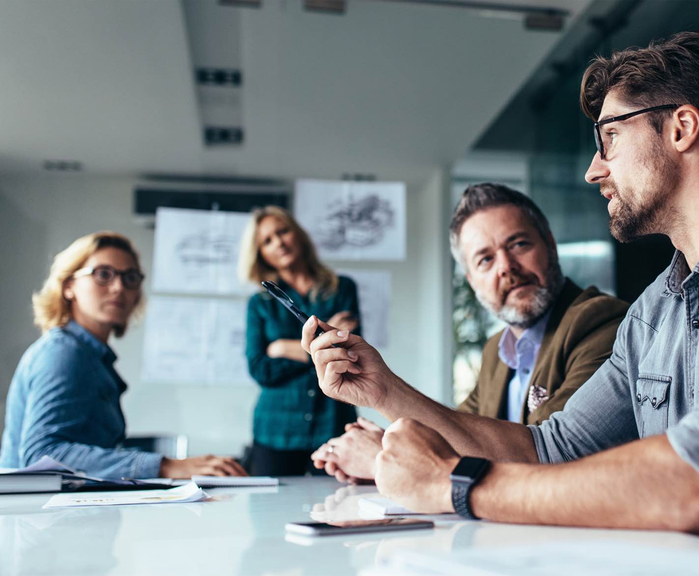 A strategy meeting around a conference table