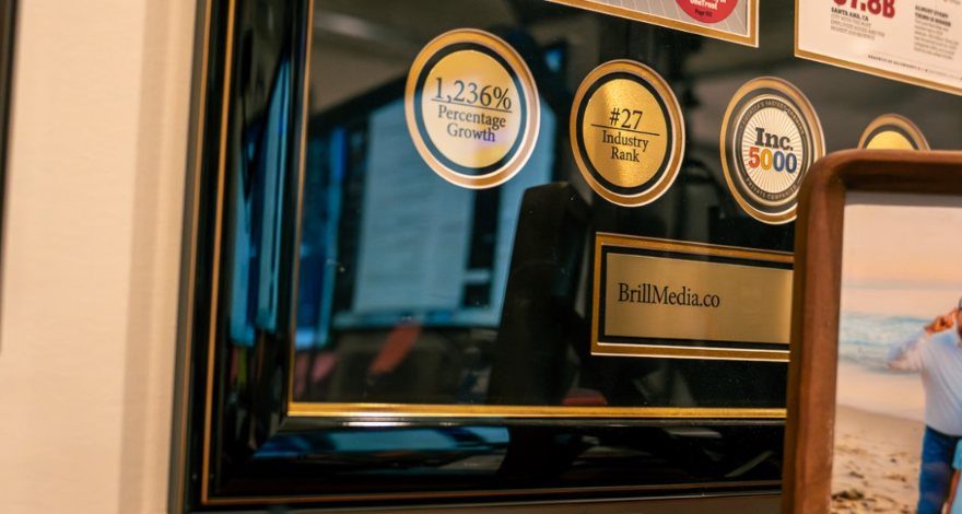 Inc. 5000 award badges on the framed recognition